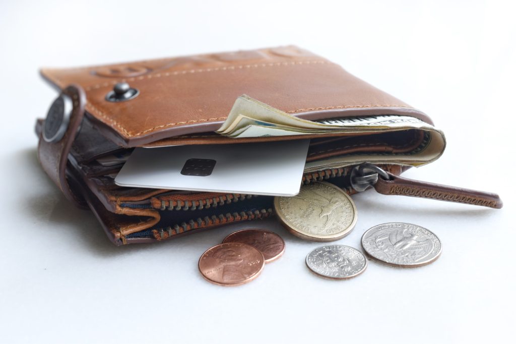 Leather wallet on a white table
